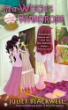 In a Witch's Wardrobe (A Witchcraft Mystery #4) - Juliet Blackwell