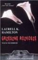 Grzeszne rozkosze - Laurell K. Hamilton