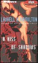 A Kiss of Shadows (Meredith Gentry, #1) - Laurell K. Hamilton, Laural Merlington