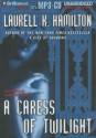 A Caress of Twilight - Laurell K. Hamilton, Laural Merlington