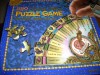 1996 FORTUNE TELLING PUZZLE GAME with Magical JONONO Pendulum recommended by World-Renowned Psychics. 18" x 24" puzzle creates the playing board. Produced by Cranford Street, Inc by Jennifer Sands, the Talking Psychic - Jennifer Sands