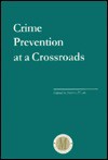 Crime Prevention at a Crossroads - Steven P. Lab, Joycelyn M. Pollock