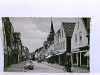 AK Aurich/Ostfr., Burgstraße; Geschäfte, Autos, Passanten; ungelaufen, ca. 1950 - unbekannt