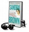 Love Beyond Reason [With Earbuds] - Sandra Brown, Renée Raudman