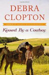 Kissed by a Cowboy (A Four of Hearts Ranch Romance) - Debra Clopton