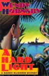 A Hard Light (A Maggie MacGowen Mystery #5) - Wendy Hornsby