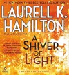 A Shiver of Light (A Merry Gentry Novel) by Hamilton, Laurell K. (2014) Audio CD - Laurell K. Hamilton