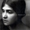 Tina Modotti: A Fragile Life - Mildred Constantine