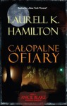 Całopalne ofiary - Laurell K. Hamilton