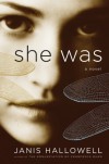 She Was: A Novel - Janis Hallowell