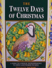 The Twelve Days of Christmas [ A Song to Unfold, With Windows to Open and Words to Sing ] Illustrated by Ann Savage (Untie a treasure inside this ribboned case, unfold the story of the Twelve Days of Christmas, with each gift hidden under an exquisitely d - Ann Savage