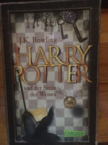 Harry Potter und der Stein der Weisen (Harry Potter,#1) - J.K. Rowling