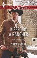 Kissed by a Rancher (Lone Star Legends) - Sara Orwig