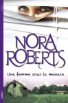 Une femme sous la menace (French Edition) - Joëlle Touati, Nora Roberts